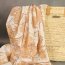 Baumwolle mit Lochstickerei und aufgedruckten Bl&uuml;ten in braunbeige auf wei&szlig; (1 St&uuml;ck = 2,50 Meter)